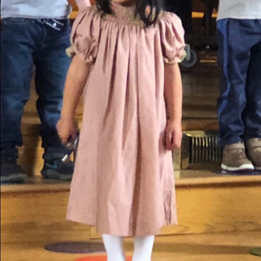 Smocked little girl’s fall dress